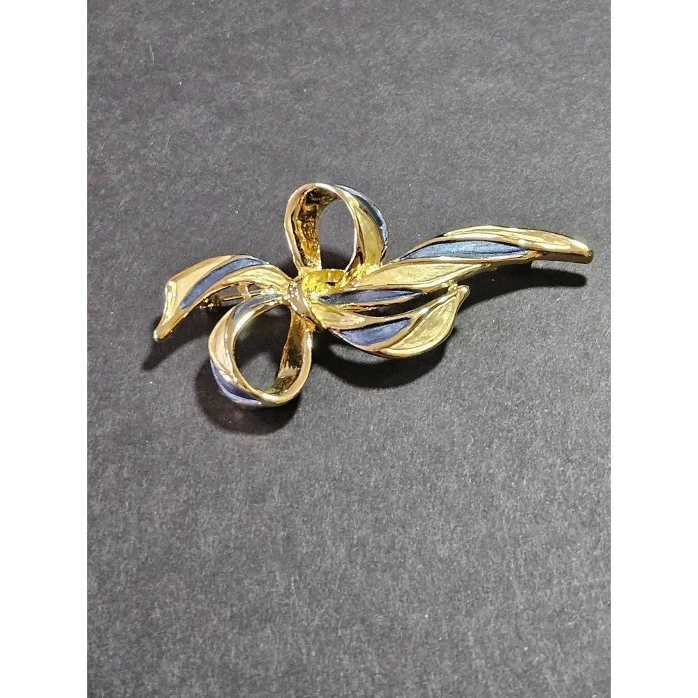 Vintage gold tone blue enamel bow brooch